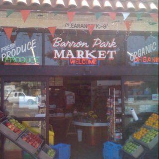 a market with a sign on the front of it